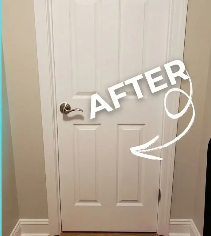 After: Restored interior door with modern lever handle